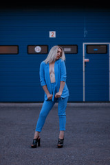 portrait of a young woman in blue suit