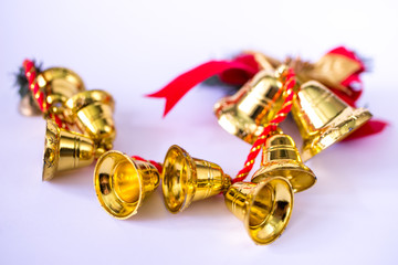 christmas jingle bells with red ribbon and bow