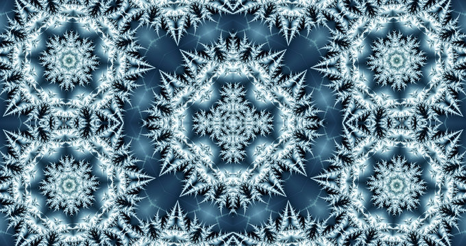 beautiful winter abstract background consisting of snowflakes made in the form of stars and various shapes can be used as a background image of a desktop on a computer