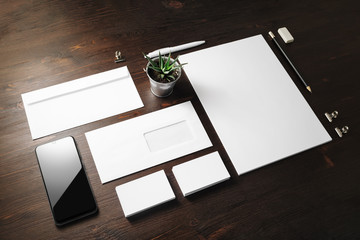 Corporate identity template. Blank stationery mock up on wooden background.