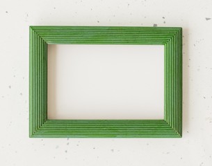 Wooden green photo frame on white background