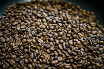 Whole grains of roasted coffee