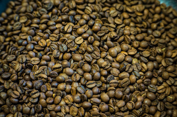 Whole grains of roasted coffee
