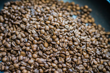 Whole grains of roasted coffee