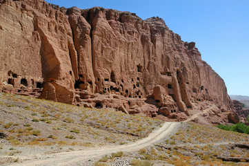 Caves in the cliffs near Bamyan (Bamiyan), Afghanistan. Local Afghan people still live in the caves. The caves are in cliffs where the Bamyan (Bamiyan) Buddhas used to stand. UNESCO site Afghanistan.