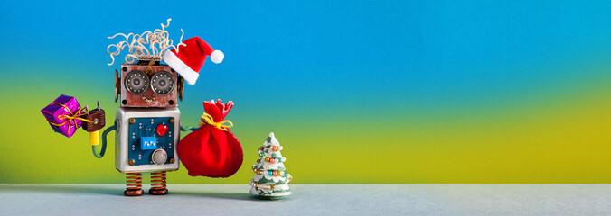 Christmas background. Funny Santa hat robot, holds box present and a red bag of gifts. Futuristic...