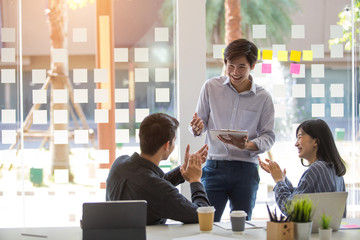 Start-up Asia business team in meeting and helped analyze the marketing problems of the company or beginning new project. Start up concept