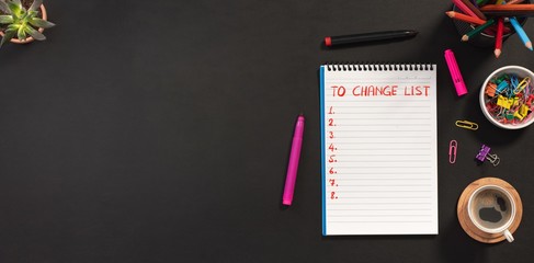 Writing To Change List, Over Head View Of Work Desk.