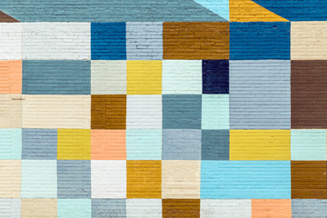  brick wall painted in rainbow colors © travelview