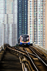 BTS Sky train in Bangkok with building