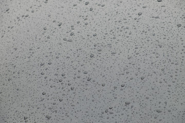 Small raindrops on a car