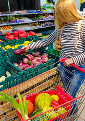 woman fruits supermarket fitness 50 plus vegetables measure basket shopping trolly red item purchase street market
