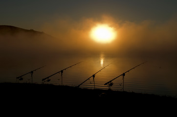 sunrise on a lake with evaporation of water