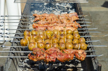 Skewers of new potatoes and bacon.