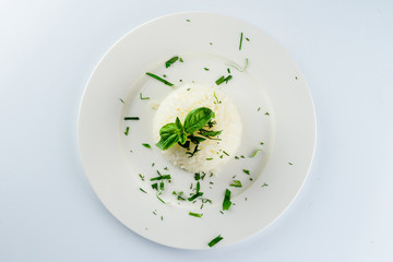 White rice with black sesame decorated with parsley