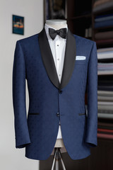 Mannequin with bespoke two button jacket in atelier	