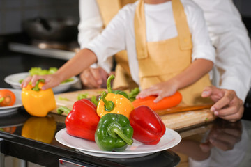 maid prepare vegetable and food material for cooking