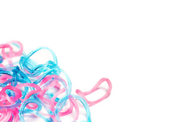Thin rubber bands for hair on a light background