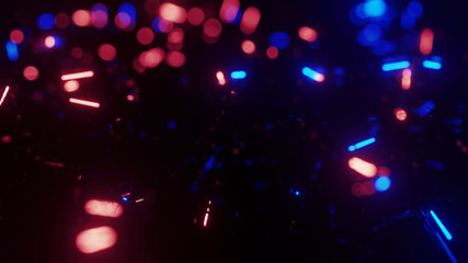 Blurred shining particles on black background with the copyspace for party invitation or cover page