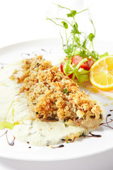 Breaded Pike Perch or Zander Fillet with Cream Sauce Isolated