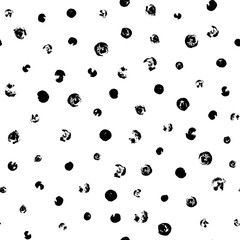 Random scattered polka dots, abstract black and white background.