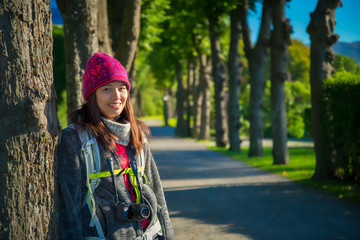 Beautiful asian woman tourist portrait and perspective view in the garden at Bergenhus Fortress, Bergen, Norway - 290110275