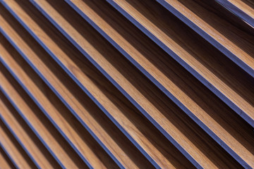 Obraz premium Diagonal bronze corrugated metal sheet background.
