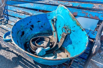Blue metal bowl on a bench