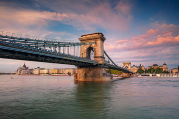 Fototapeta premium Budapest, Hungary. Cityscape image of Budapest with Chain Bridge and parliament building during summer sunset.