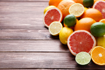 Citrus fruits on brown wooden table
