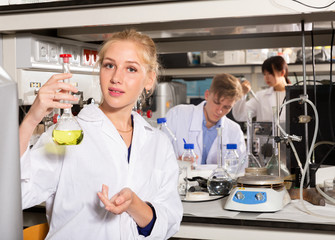 Female lab technician working with reagents