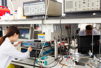 Students performing experiments in laboratory