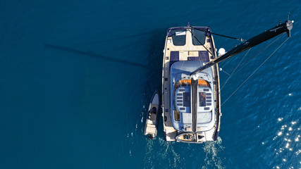 Aerial drone top down photo of luxury Catamaran sail boat docked in Mediterranean popular Aegean...