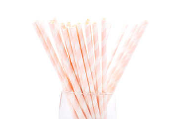 Paper straws on white background