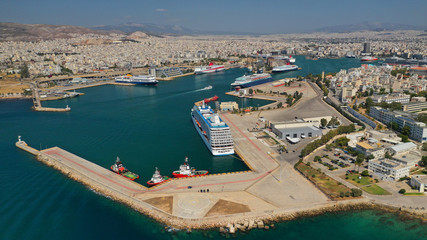 Aerial drone panoramic photo of busy port of Piraeus, the largest in Greece and one of the largest passenger ports in Europe, Attica, Greece 