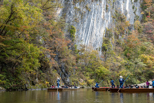 Geibikei Gorge River Cruises in Autumn foliage season. Beautiful scenery landscapes view in sunny weather day. Ichinoseki, Iwate Prefecture, Japan