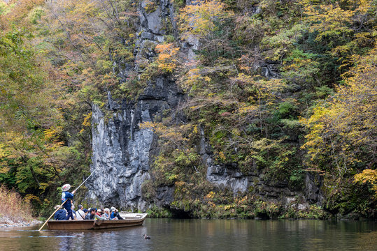 Geibikei Gorge River Cruises in Autumn foliage season. Beautiful scenery landscapes view in sunny weather day. Ichinoseki, Iwate Prefecture, Japan