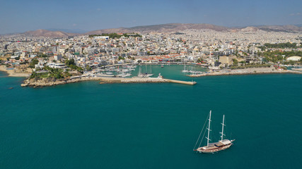 Fototapeta na wymiar Aerial drone photo of iconic round port of Mikrolimano, Attica, Greece