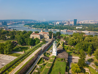 Fototapeta na wymiar Aerial view to Clock tower (Sahat kula) and Kalemegdan fortress at Belgrade. Summer photo from drone. Serbia