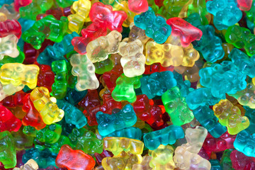 Fototapeta na wymiar Photograph of a basket of gummy candies, representing bears. All colored and well light.