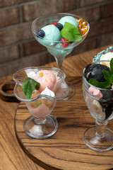 Close up of summer ice cream desserts with sweet toppings