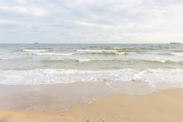 Fototapeta na wymiar Empty beach and tropical sea with beautiful sky background.