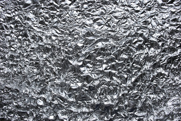 Wrinkled foil silver background texture
