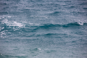 Sea wave close up, low angle view, cross processing effect.