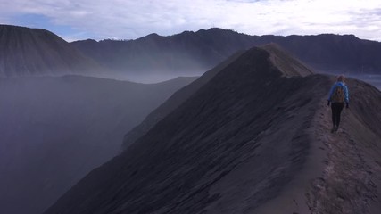 Walks at the edge of Bromo  volcano in Java island, Indonesia