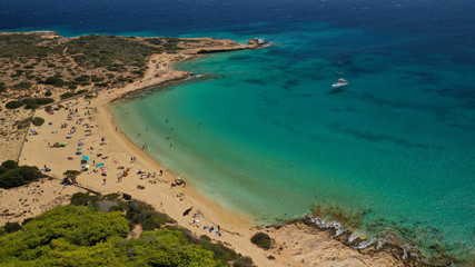 Aerial drone photo of iconic breathtaking turquoise sandy beach of Platia Pounta or Italida in famous island of Koufonissi, Small Cyclades, Greece