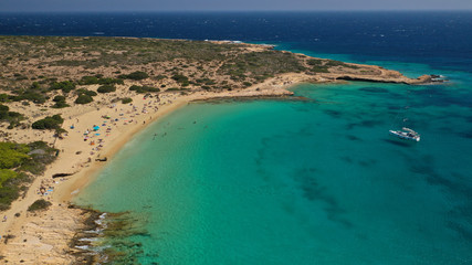 Fototapeta na wymiar Aerial drone photo of iconic breathtaking turquoise sandy beach of Platia Pounta or Italida in famous island of Koufonissi, Small Cyclades, Greece