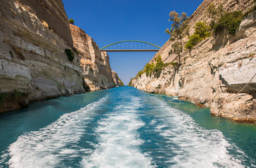 Passing through the Corinth Canal by yacht, Greece. The Corinth Canal connects the Gulf of Corinth...