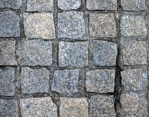 Fototapeta premium Stone pavers are lined with stones of the same size and shape