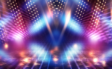 Abstract background. Dark empty stage, multi-colored rays of a neon searchlight, wet asphalt,...